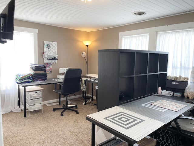 carpeted home office featuring wooden ceiling