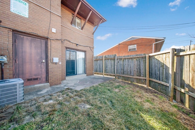 view of yard featuring a patio and cooling unit