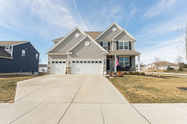 view of front facade featuring a front yard and covered porch