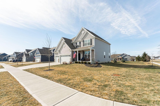 view of front of house with a garage, a front yard, and a porch