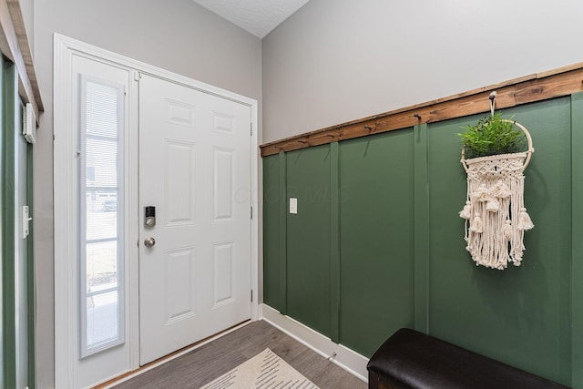 entrance foyer featuring dark hardwood / wood-style flooring