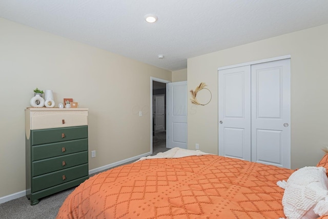 bedroom with carpet floors and a closet