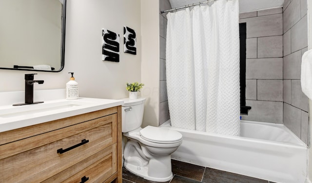 full bathroom with shower / tub combo with curtain, vanity, and toilet