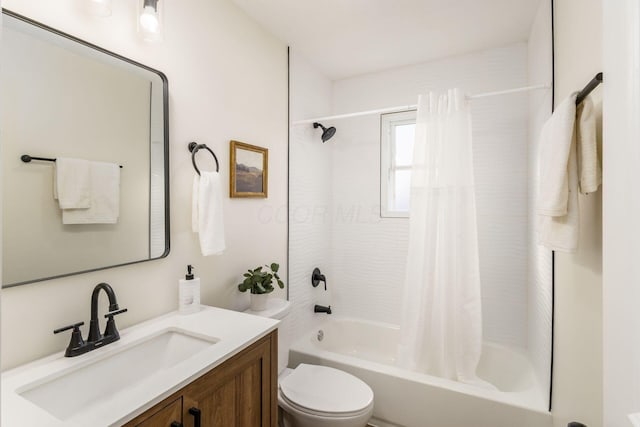 full bathroom featuring vanity, toilet, and shower / bath combo with shower curtain