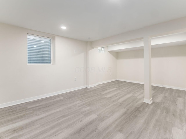 basement with light wood-type flooring