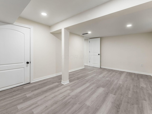 basement with light wood-type flooring