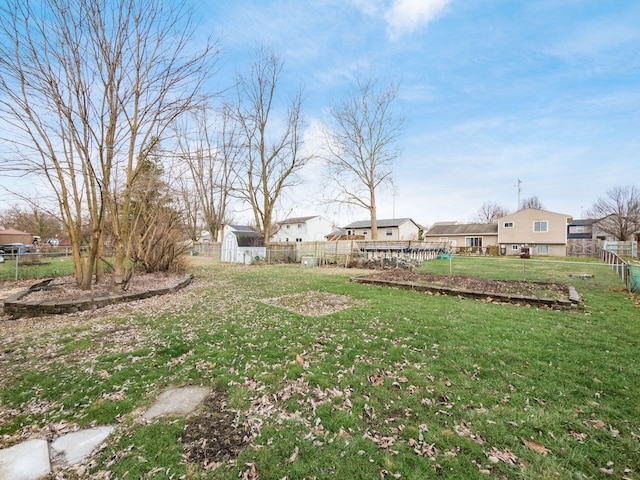 view of yard featuring a storage unit