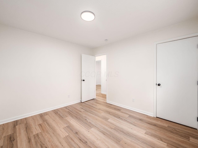 unfurnished bedroom featuring light hardwood / wood-style floors