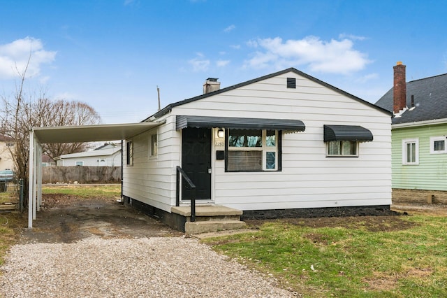 view of front facade featuring a carport