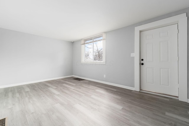 empty room featuring light hardwood / wood-style flooring