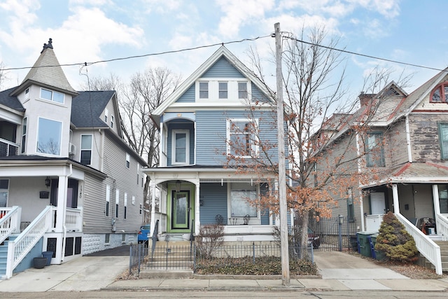 victorian home featuring a porch