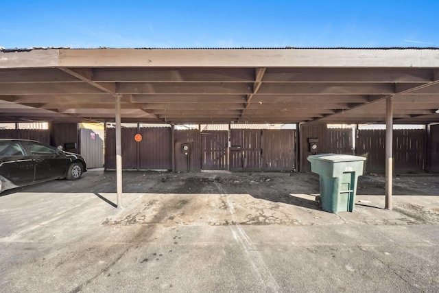 covered parking lot with fence