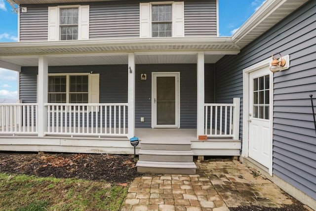 property entrance with a porch