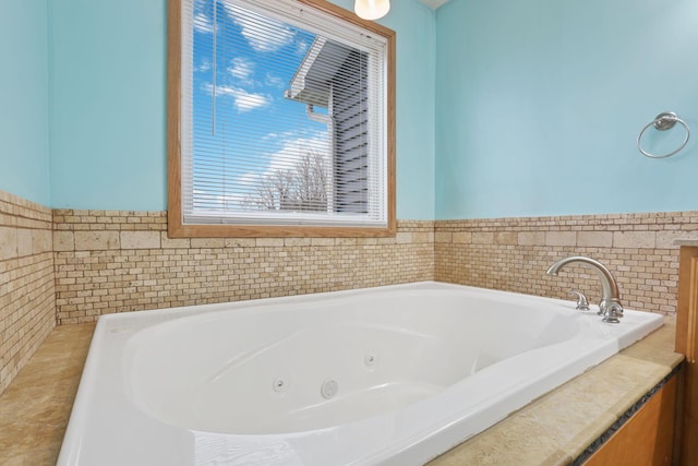 bathroom featuring a tub