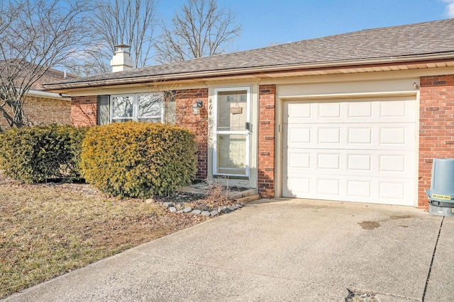 single story home featuring a garage