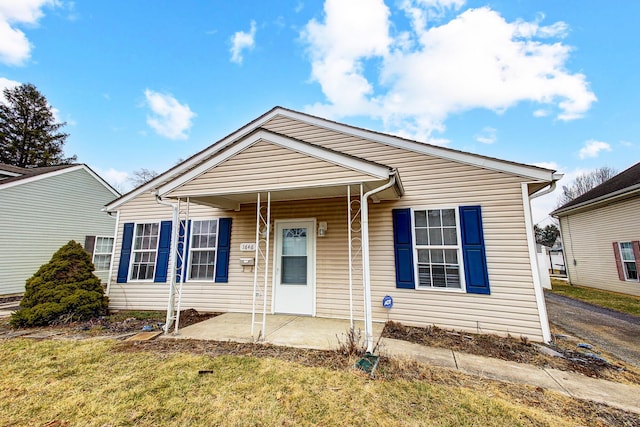 bungalow-style home with covered porch