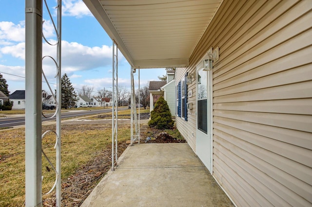 view of patio with a residential view