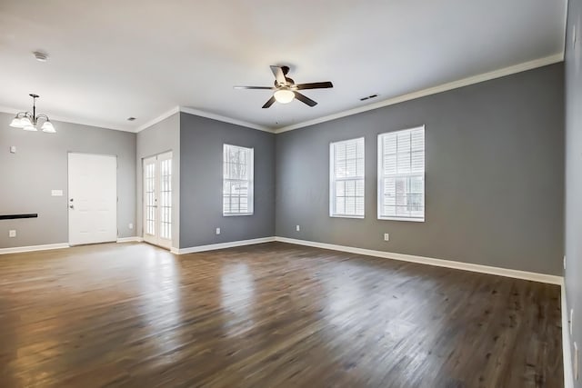 empty room featuring visible vents, baseboards, and a healthy amount of sunlight