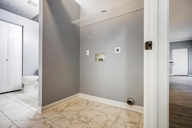 washroom featuring visible vents, laundry area, hookup for a washing machine, marble finish floor, and electric dryer hookup