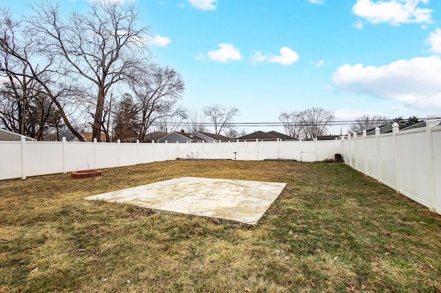 view of yard featuring a fenced backyard and a patio area