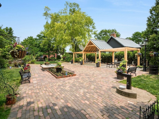 view of home's community featuring a gazebo and a patio area