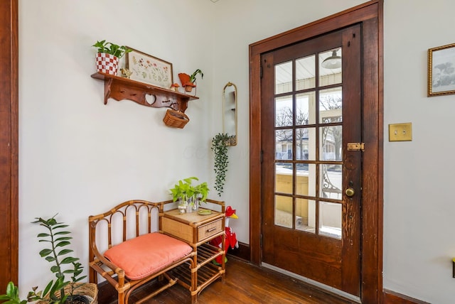 doorway featuring wood finished floors