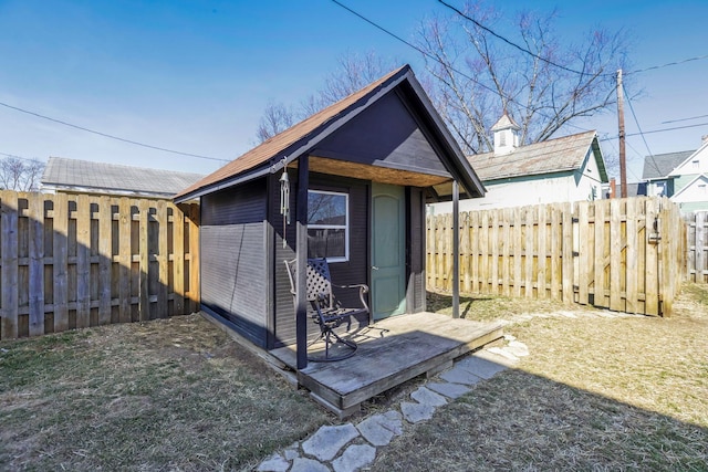 view of shed with a fenced backyard