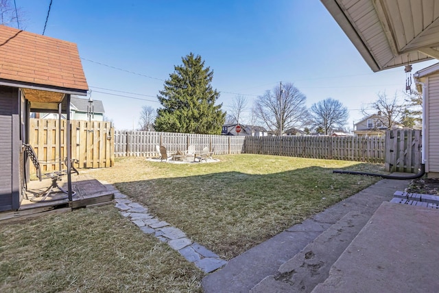 view of yard featuring a patio and a fenced backyard