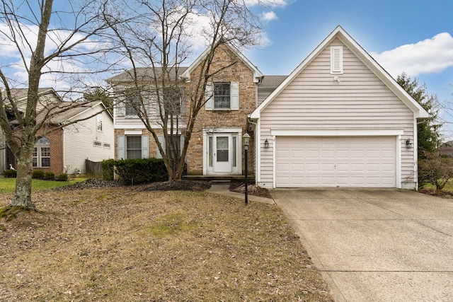 traditional-style house with a garage, brick siding, and driveway