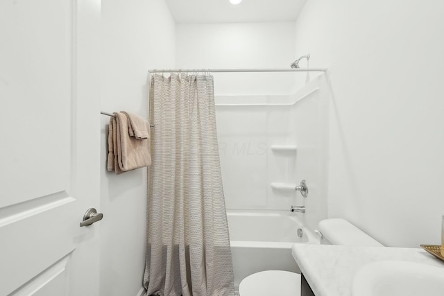 full bathroom with toilet, shower / tub combo, and vanity