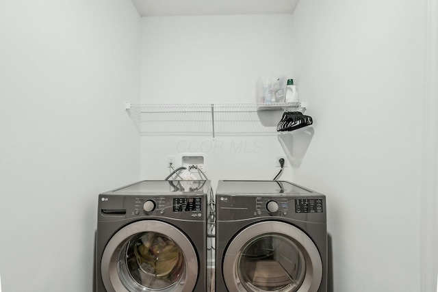 laundry room with laundry area and separate washer and dryer