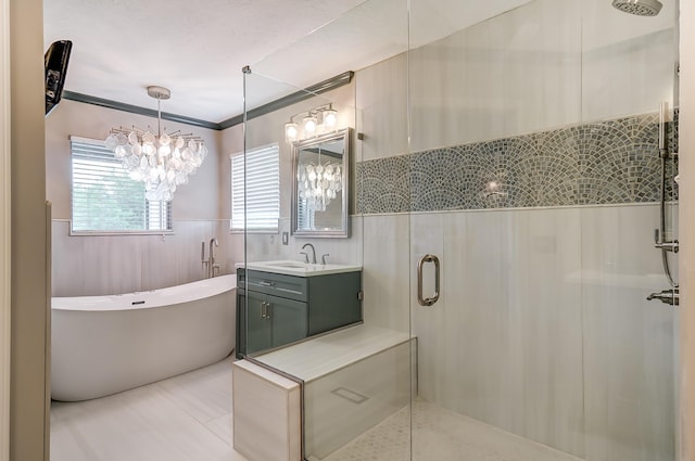 bathroom with crown molding, vanity, and independent shower and bath