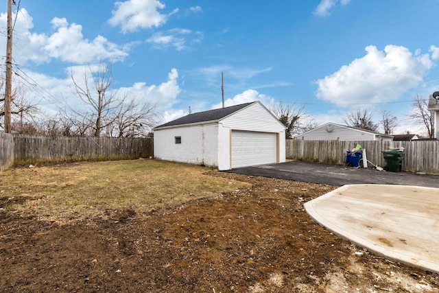 garage with a yard