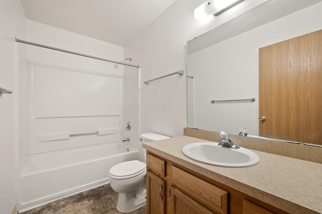 full bathroom with washtub / shower combination, vanity, and toilet