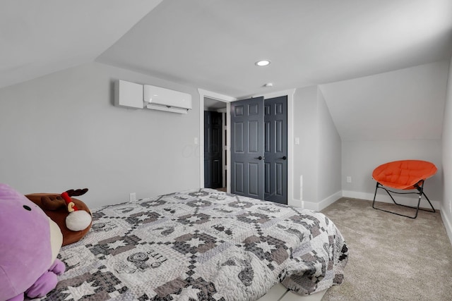 carpeted bedroom with lofted ceiling and a wall mounted AC