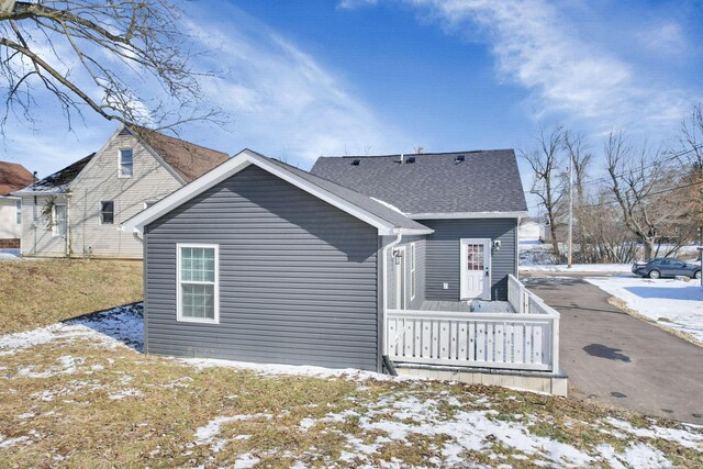 view of snow covered house