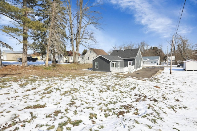 view of snow covered house