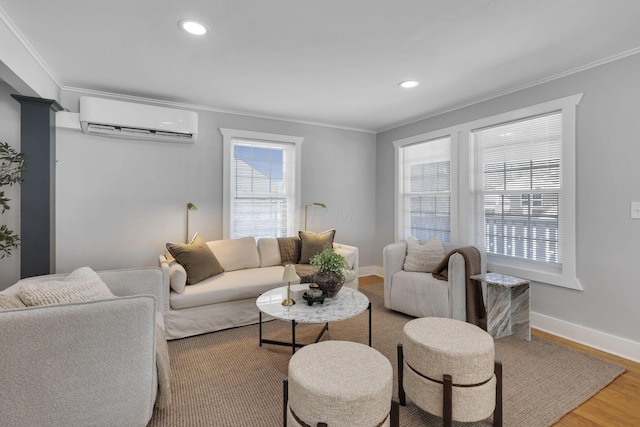 living room featuring a wall unit AC, crown molding, and hardwood / wood-style floors