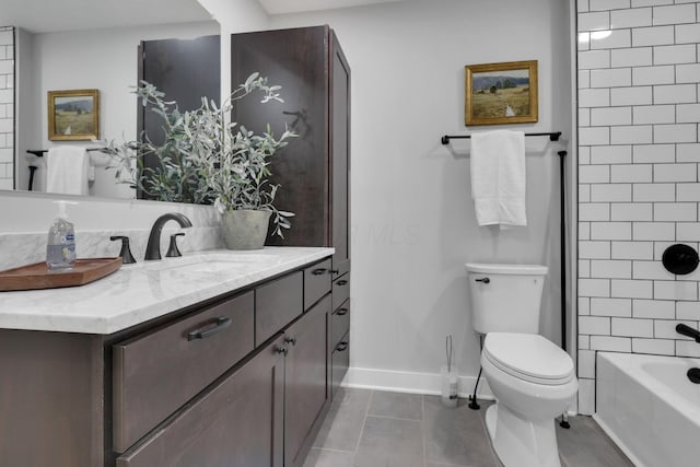 full bathroom with tiled shower / bath combo, vanity, toilet, and tile patterned floors