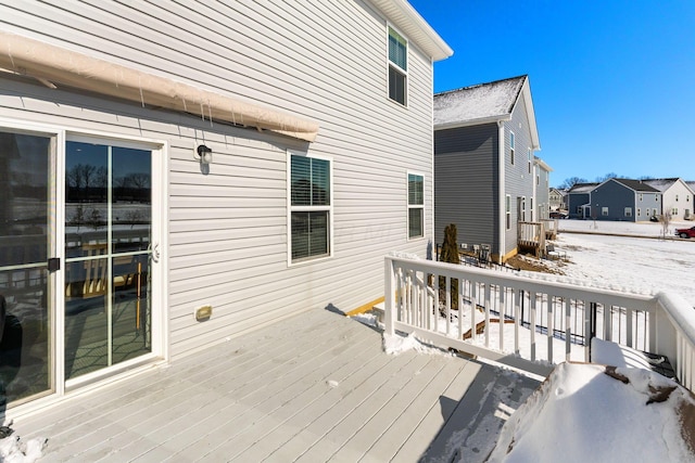 view of snow covered deck