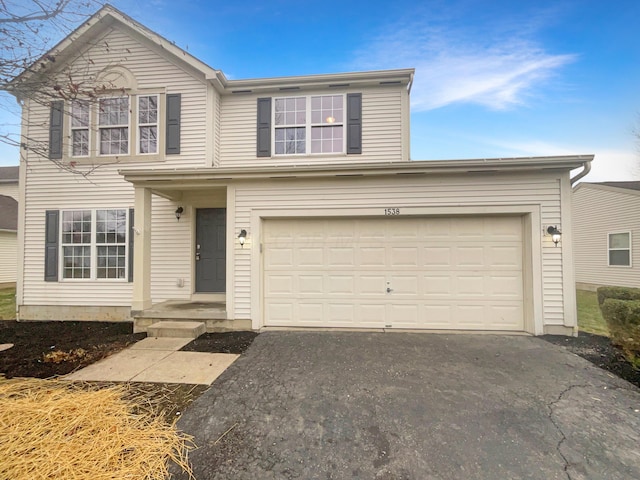 view of front of home featuring a garage