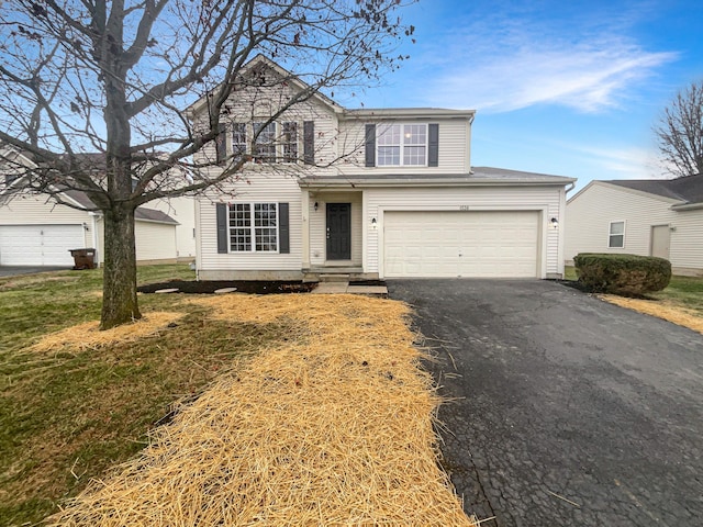 front facade with a front yard