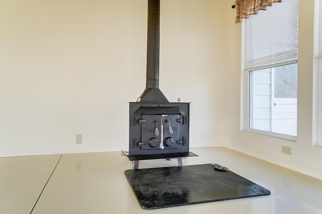 interior details featuring a wood stove