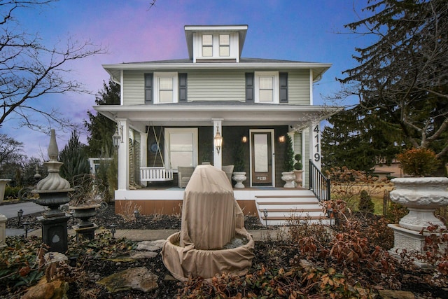 view of front of house featuring covered porch