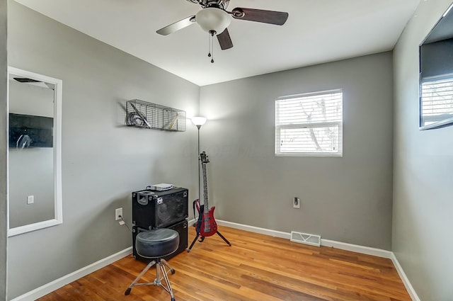 miscellaneous room featuring hardwood / wood-style flooring and ceiling fan