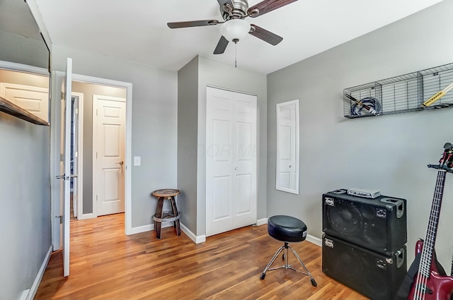 recreation room featuring ceiling fan and wood-type flooring