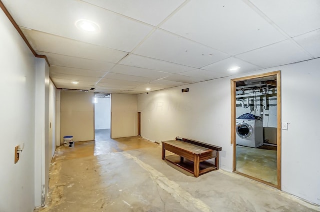 basement featuring washer / clothes dryer and a paneled ceiling