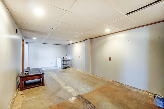 basement featuring a drop ceiling