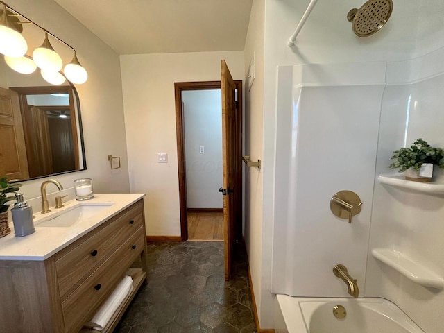 bathroom with washtub / shower combination and vanity