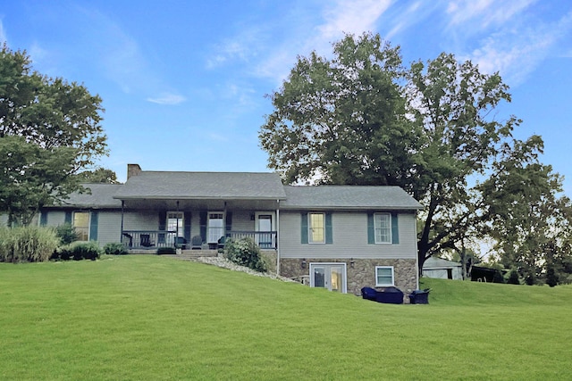 1048 Parkway Dr, Logan, OH 43138 - view of front of house with covered porch, stone siding, and a front yard